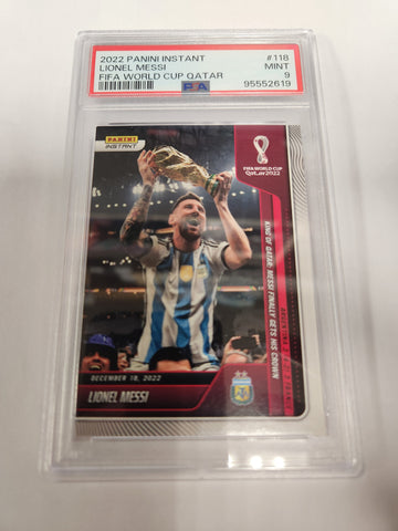 Lionel Messi King of Qatar: Messi Finally Gets His Crown 2022 Panini Instant World Cup Qatar FIFA #118 (1 of 22081) (PSA Graded 9 Mint)