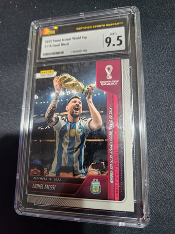 Lionel Messi King of Qatar: Messi Finally Gets His Crown 2022 Panini Instant World Cup Qatar FIFA #118 (1 of 22081) (CSG Graded 9.5)